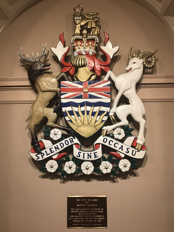 The B.C. Coat of Arms in the Lower Rotunda. This sculpture was cast in aluminum by Elek Imredy and was unveilled for Her Majesty Queen Elizabeth II on October 15, 1987, while she was in Vancouver.