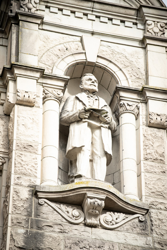 This statue of Dr. John Sebastian Helmcken is located on the exterior of the Legislative Library.