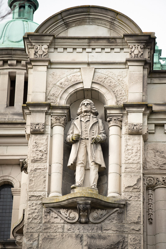 This statue of Dr. John McLoughlin is located on the exterior of the Legislative Library.