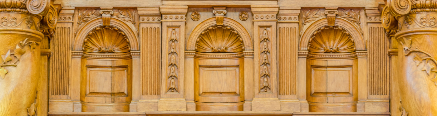  Wooden architectural detail with arches.