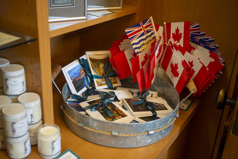 Gift shop items for sale: Canadian flags, cards and candles